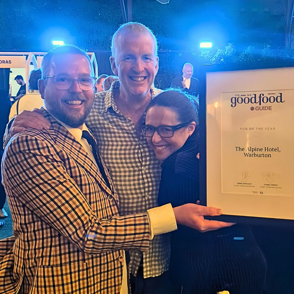 The Alpine Hotel team holding the Pub of the Year certificate at The Age Good Food Guide 2027 awards night