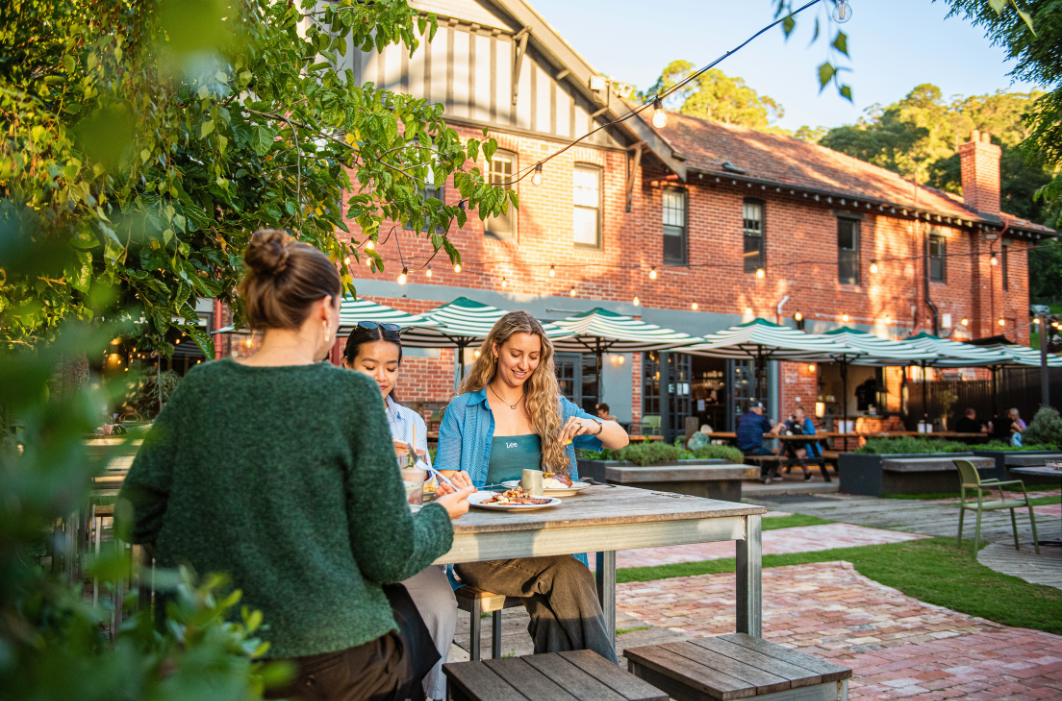 Guests enjoying a meal in beer garden